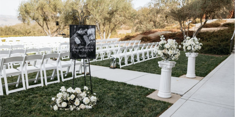 Wedding ceremony seating outside on a sunny day
