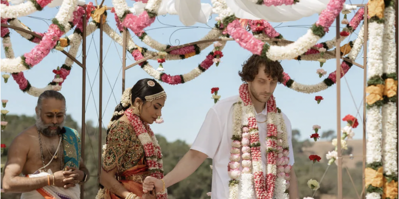 At this multicultural wedding in San Francisco, the bride wore her mother's 30-year-old bridal sari