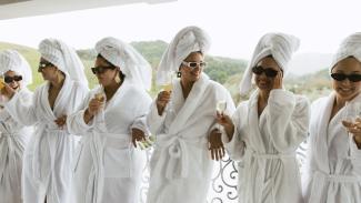 Bridal party relaxing together at a Morgan Hill–area wedding venue with on-site accommodations before the ceremony